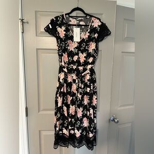 BloomChic Black Dress with Pink Floral Print and Crochet Detail